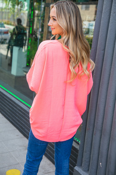 Neon Coral Woven V Neck Dolman Short Sleeve Top